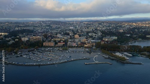 Dolly in drone shot over Ouchy Port in Lausanne at sunset in Switzerland photo