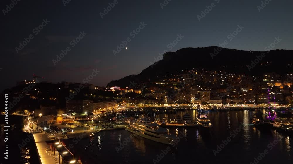 Monaco harbor superyachts under moonlit sky Monaco harbor superyachts under moonlit sky