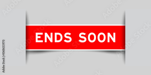 Red color square label sticker with word ends soon that inserted in gray background