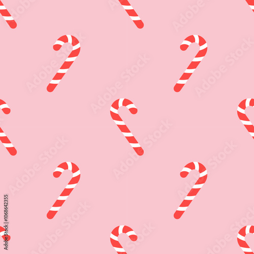 Cute Christmas seamless pattern with candy canes. Flat pink background design. Repeating print for fabric, wrapping paper, textile, wallpaper