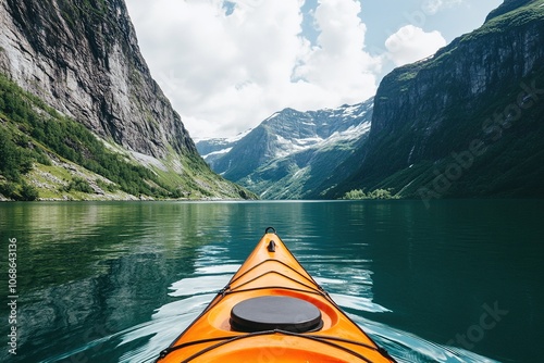 Fototapeta Naklejka Na Ścianę i Meble -  Kayak nose on serene mountain lake