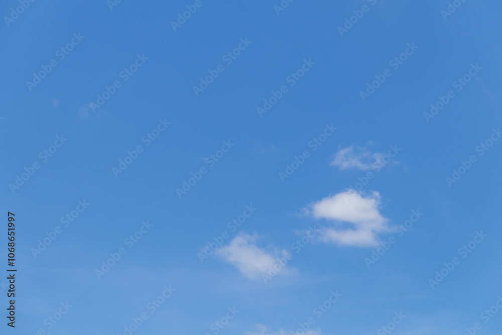 Blue sky background with tiny clouds, Nature cloud blue sky background, Blue Sky with Fluffy White Clouds on a Sunny Summer Day Blue sky background with tiny clouds, Nature cloud blue sky background, Blue Sky with Fluffy White Clouds on a Sunny Summer Day