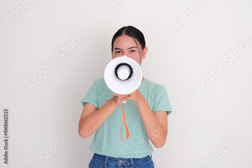 A women annouce something using megaphone photo