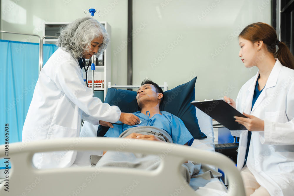 Fototapeta premium doctor talking to male patient at bed in hospital.