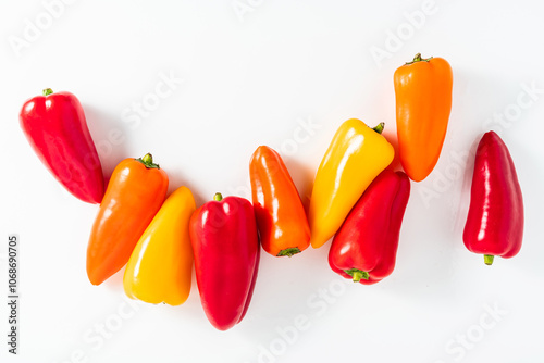small colored peppers on white. recipes, sale