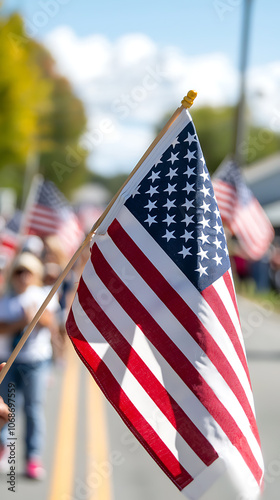 Community celebrates veterans day with a patriotic parade and american flags waving