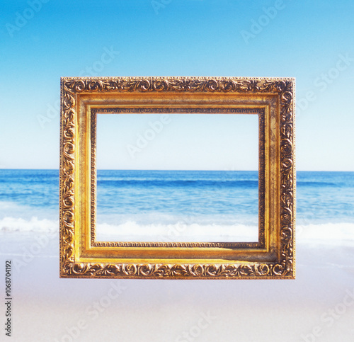 USA, New Jersey, Spring Lake, Golden ornate picture frame against beach and sea