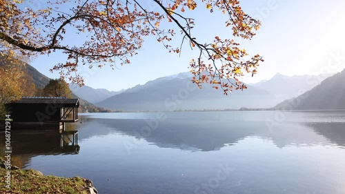 Autumn landscape. Beautiful lake in the mountain scenery. Zell am See. Austrian Alps