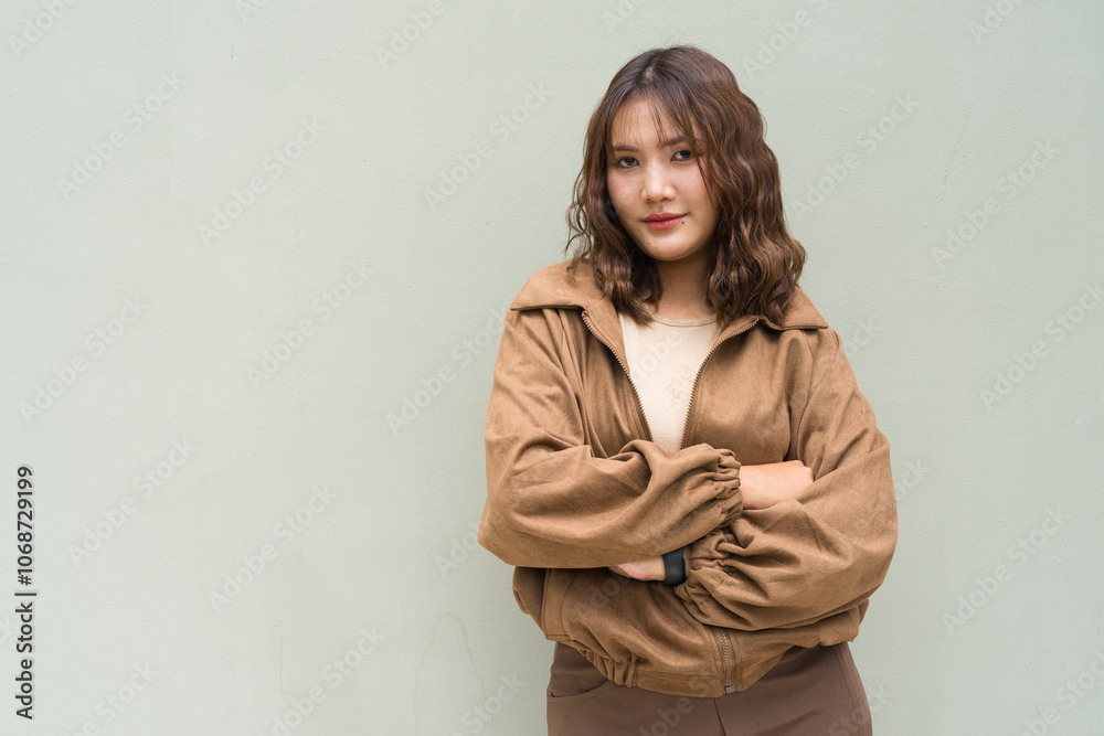 Portrait of Beautiful And Young Cute Asian Woman Against Outdoors Studio Background Portrait of Beautiful And Young Cute Asian Woman Against Outdoors Studio Background