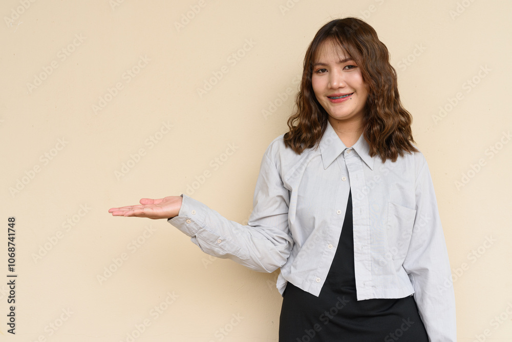 Portrait of Beautiful And Young Cute Asian Woman Against Plain Background Outdoors Portrait of Beautiful And Young Cute Asian Woman Against Plain Background Outdoors