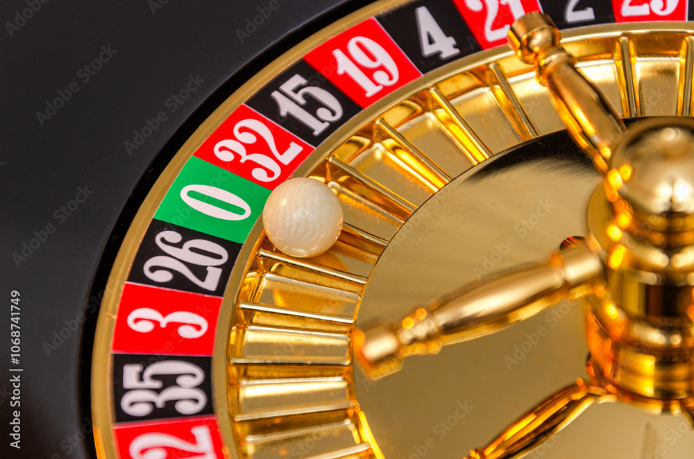 The roulette wheel spins in the casino The roulette wheel spins in the casino