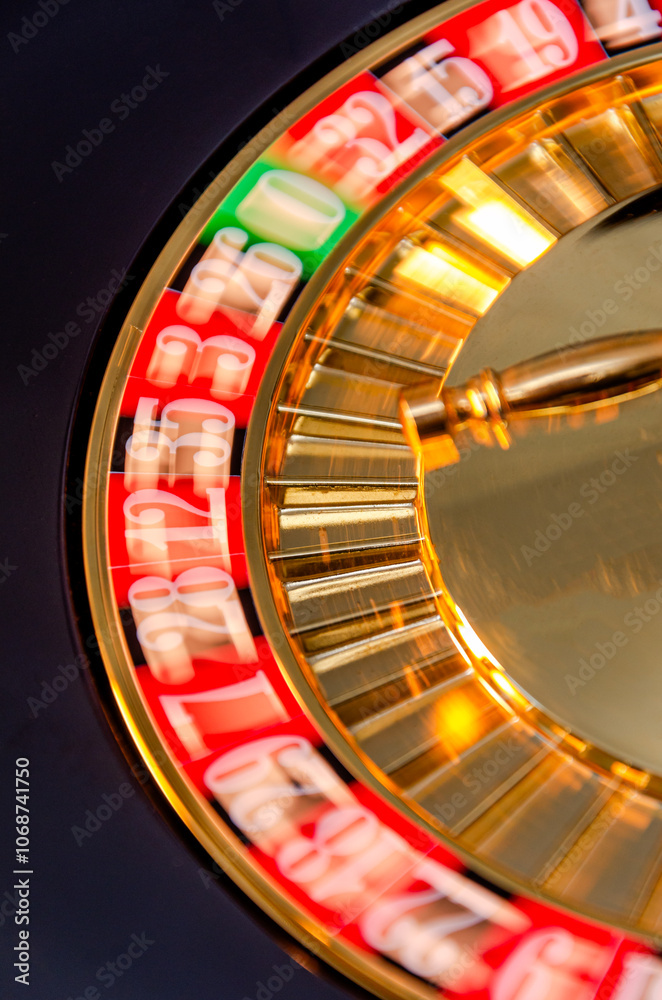 The roulette wheel spins in the casino The roulette wheel spins in the casino
