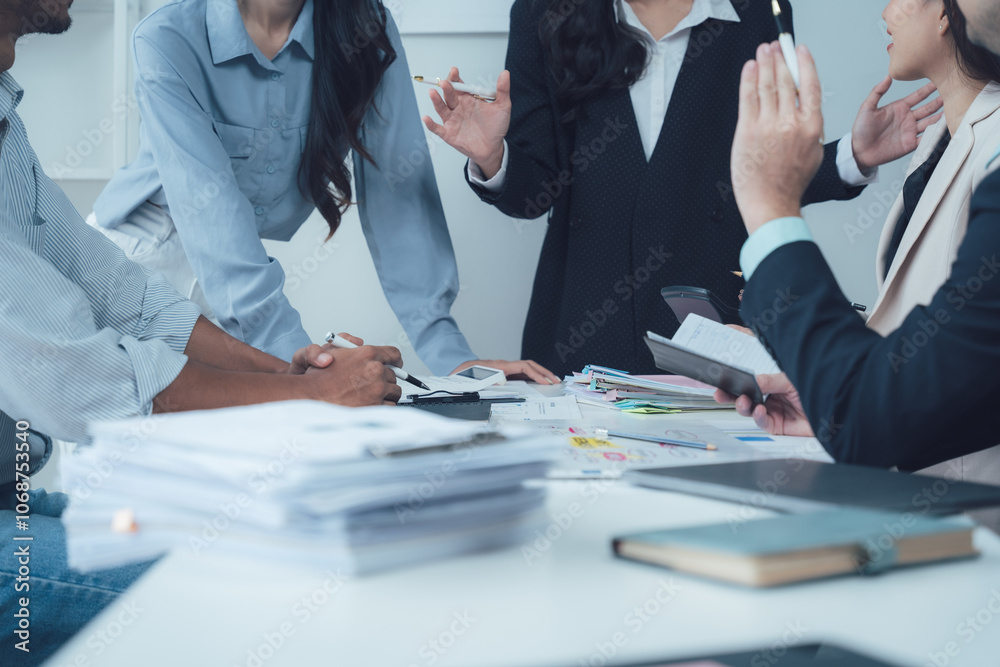 Collaborative Brainstorming: A diverse team of business professionals engaged in an animated discussion, their hands gesturing and ideas flowing. Collaborative Brainstorming: A diverse team of business professionals engaged in an animated discussion, their hands gesturing and ideas flowing.