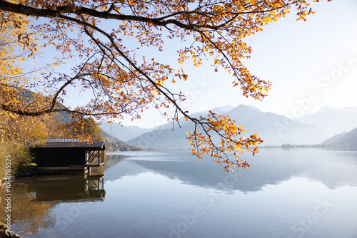 Mountain lake in autumn landscape with snowy mountains in the background. Zell am See. Austria