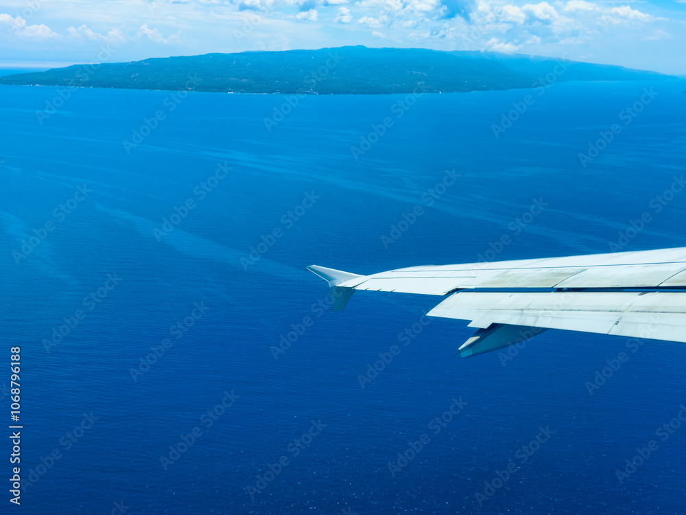 Naklejka premium Dumaguete, Philippines - Aerial photography of the seascape under the blue sky