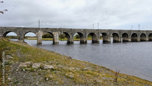 Obraz na płótnie Old stone bridge over Shannon river At Shannonbridge, county Offaly, Ireland, historic landmark, nature background w salonie
