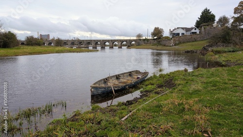 Obraz na płótnie Old wooden fishing boat in river Shannon at Shannonbridge, Offaly, Ireland, nature background w salonie