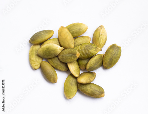 Pumpkin seeds. Assorted nuts mix floating on white background. Fresh dry fruits isolated.