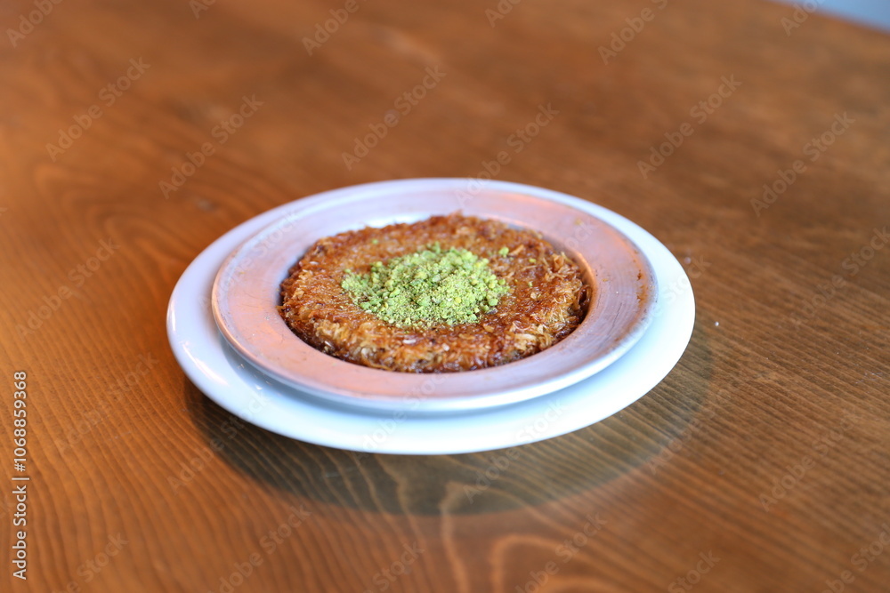 Crispy Kataifi Pastry with Sweet Cheese and Pistachio, a Traditional Turkish Dessert Crispy Kataifi Pastry with Sweet Cheese and Pistachio, a Traditional Turkish Dessert