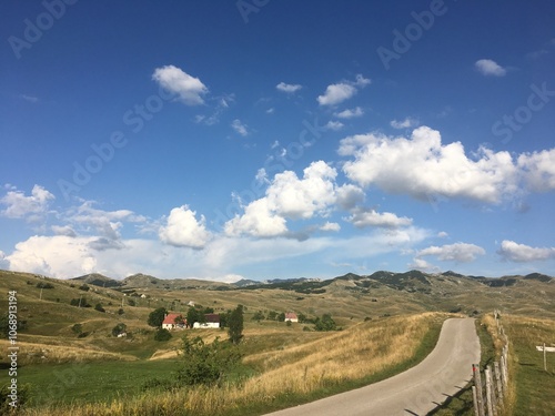 Countryside Road Leading to Mountain Views in Durmitor, Montenegro