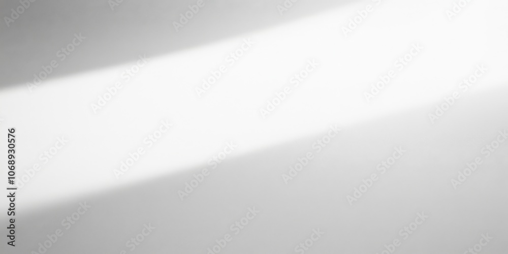 Minimalist gradient background with soft light and shadow effects, providing a versatile and neutral canvas for modern design projects and creative compositions