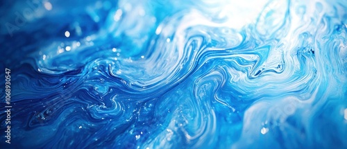 A mesmerizing abstract image featuring swirling blue tones and textures.