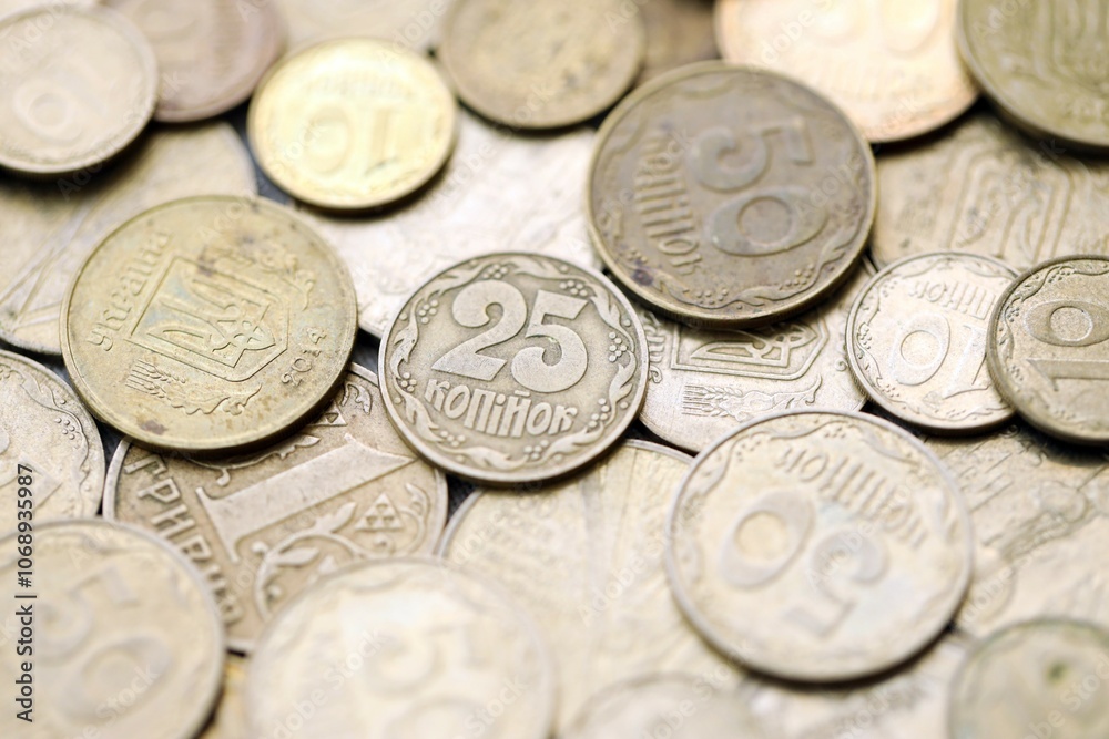 Big pile of different coins from various time period in Ukraine. Shiny Ukrainian money background Big pile of different coins from various time period in Ukraine. Shiny Ukrainian money background