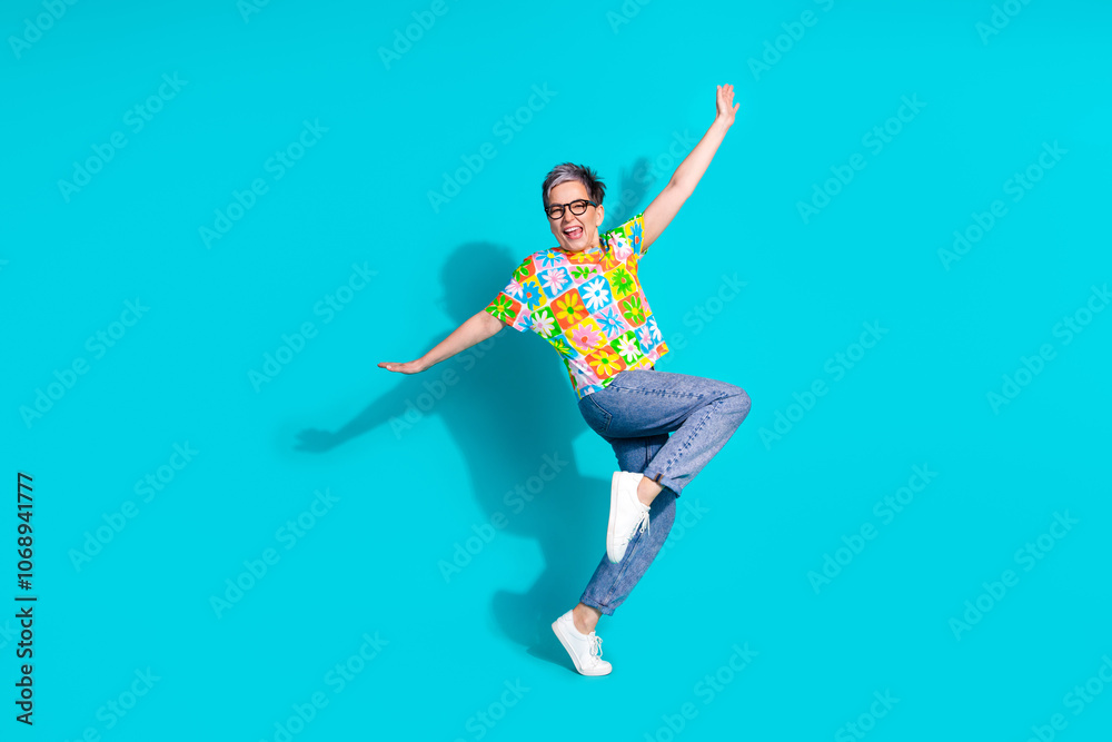 Full length portrait of pretty aged lady enjoy dancing isolated on turquoise color background Full length portrait of pretty aged lady enjoy dancing isolated on turquoise color background