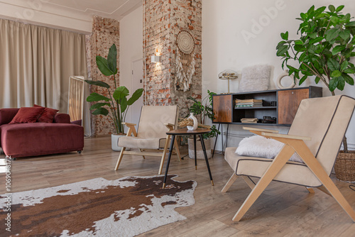 Schilderij op canvas Bright and spacious living area featuring modern furniture and natural light in