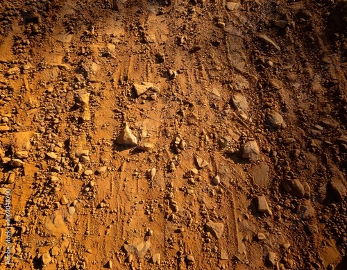 dirt terrain or gravel stone road surface pattern in outdoor environmental. Background and textured photo