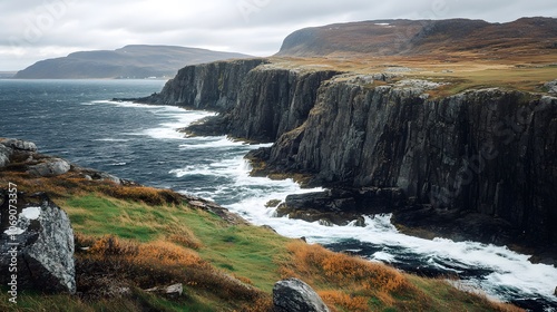 A coastal landscape with rugged cliffs, crashing waves, and wind-swept vegetation.