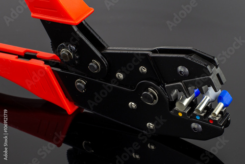 Foto Close Up of Cable Crimper Tool with Connectors