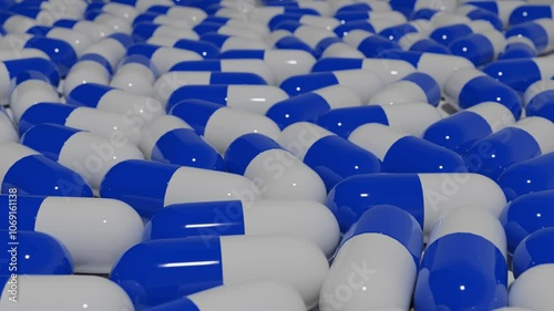 Overhead Dolly Shot of Colorful Capsules in Motion