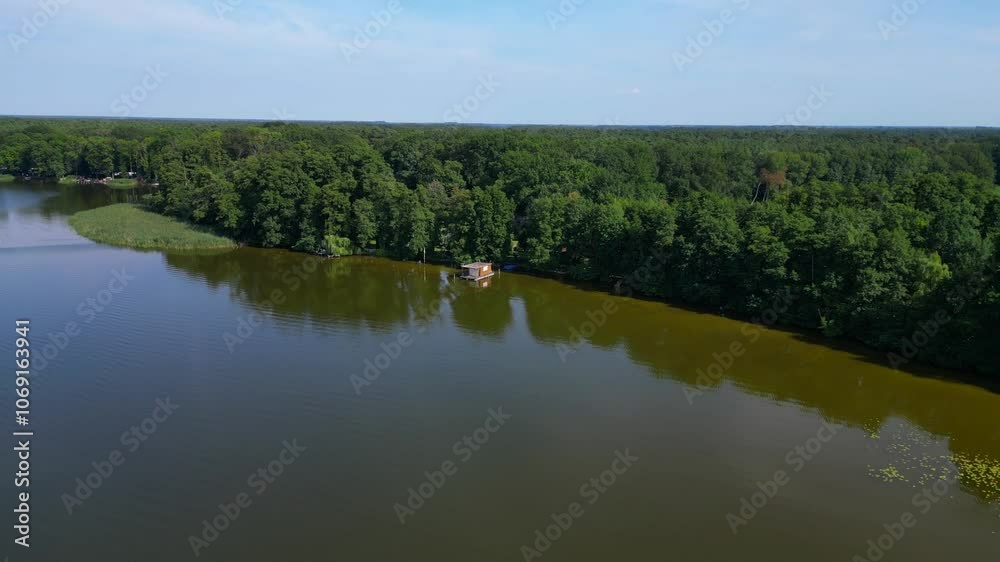 Lake Houseboat, calm water, dense forest. Lovely aerial view flight drone Lake Houseboat, calm water, dense forest. Lovely aerial view flight drone