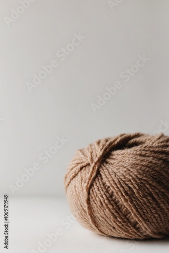 brown warm and cozy yarn ball of alpaca wool.