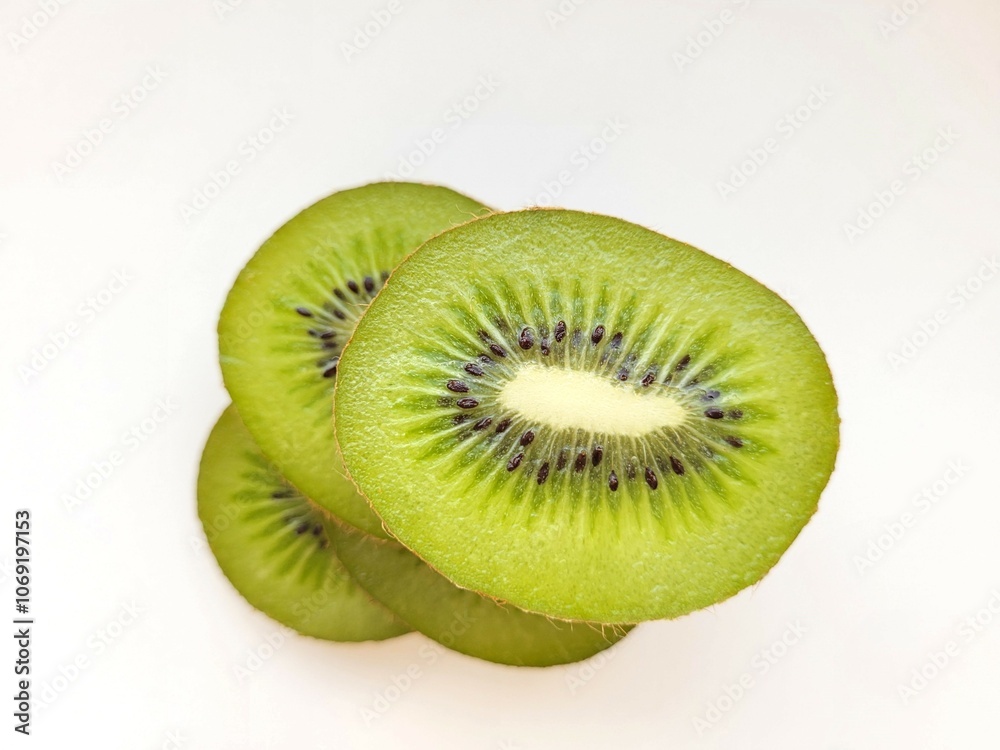 Sliced portion of juicy kiwi for tropical taste. Sliced portion of juicy kiwi for tropical taste.