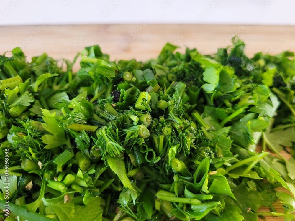 Chopped parsley leaves and dill. Chopped parsley leaves and dill.