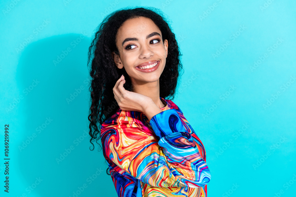 Fototapeta premium Photo of pretty young girl look empty space ad wear pullover isolated on teal color background
