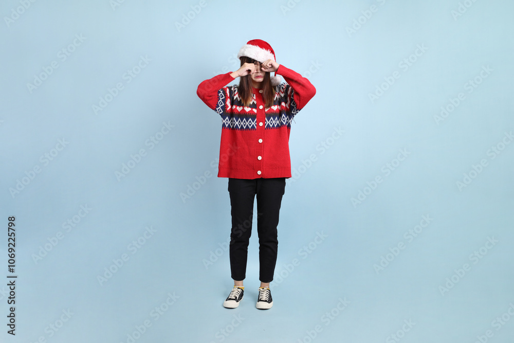 Woman wearing Santa hat Woman wearing Santa hat