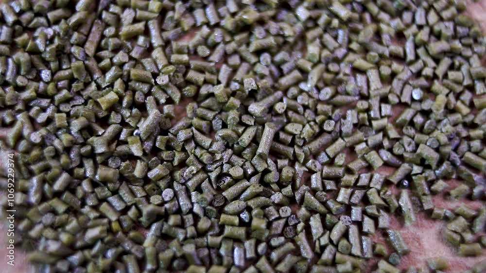 Macro. Technical features and details of black smokeless powder granules. Black smokeless gunpowder Macro. Technical features and details of black smokeless powder granules. Black smokeless gunpowder