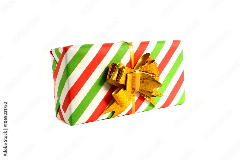 Obraz premium Gift box with a bow lies on a white isolated background. 