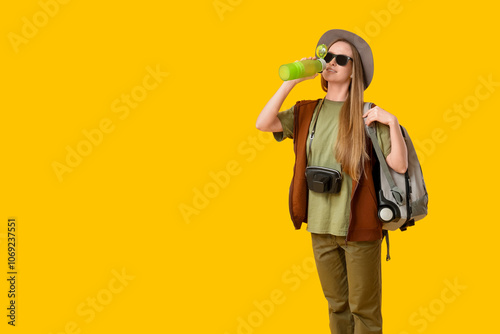 Young woman drinking someth...