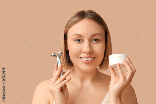 Woman with massage roller a...