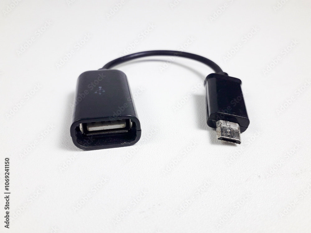 USB adapter cable for smartphone isolated white background USB adapter cable for smartphone isolated white background