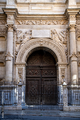 Intricate Facade Featuring a Grand Wooden Entrance