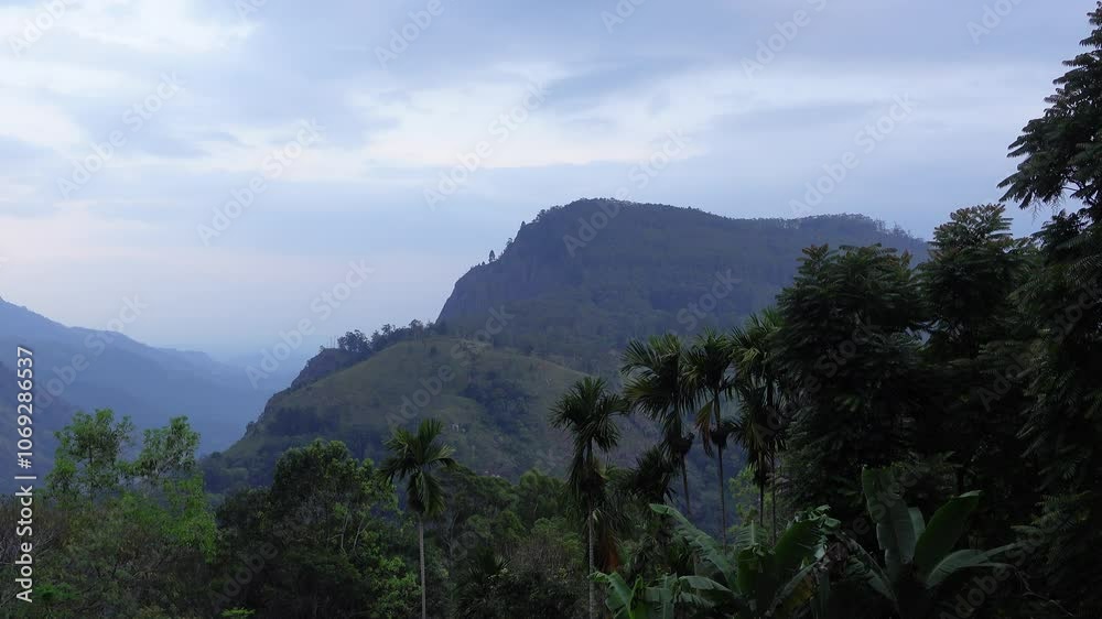 Amazing static sunset panorama view of Ella Rock and surrounding mountains in Ella, Sri Lanka