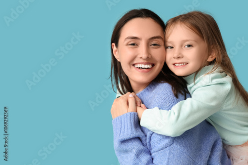 Little girl hugging her mot...