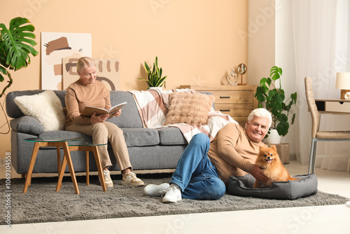 Happy senior couple with cu...