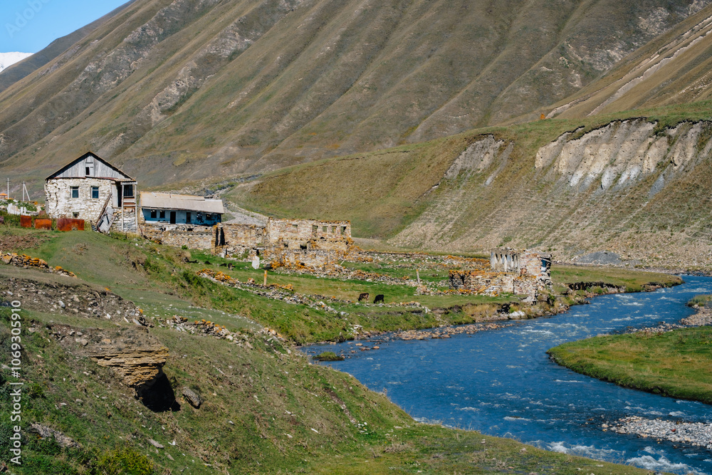 Fototapeta premium The almost abandoned village of Ketrisi in the Truso Gorge located in the Kazbegi mountains region of Georgia