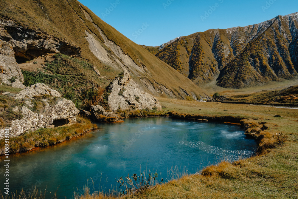 Φωτογραφία The blue, bubbling waters of Lake Abano, in the Truso Gorge in the Kazbegi regio
